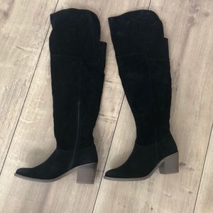Thigh high black boots